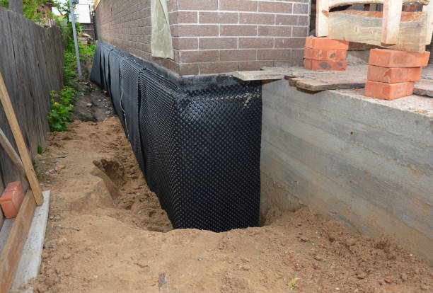 Happy homeowners after waterproofing job in Narberth